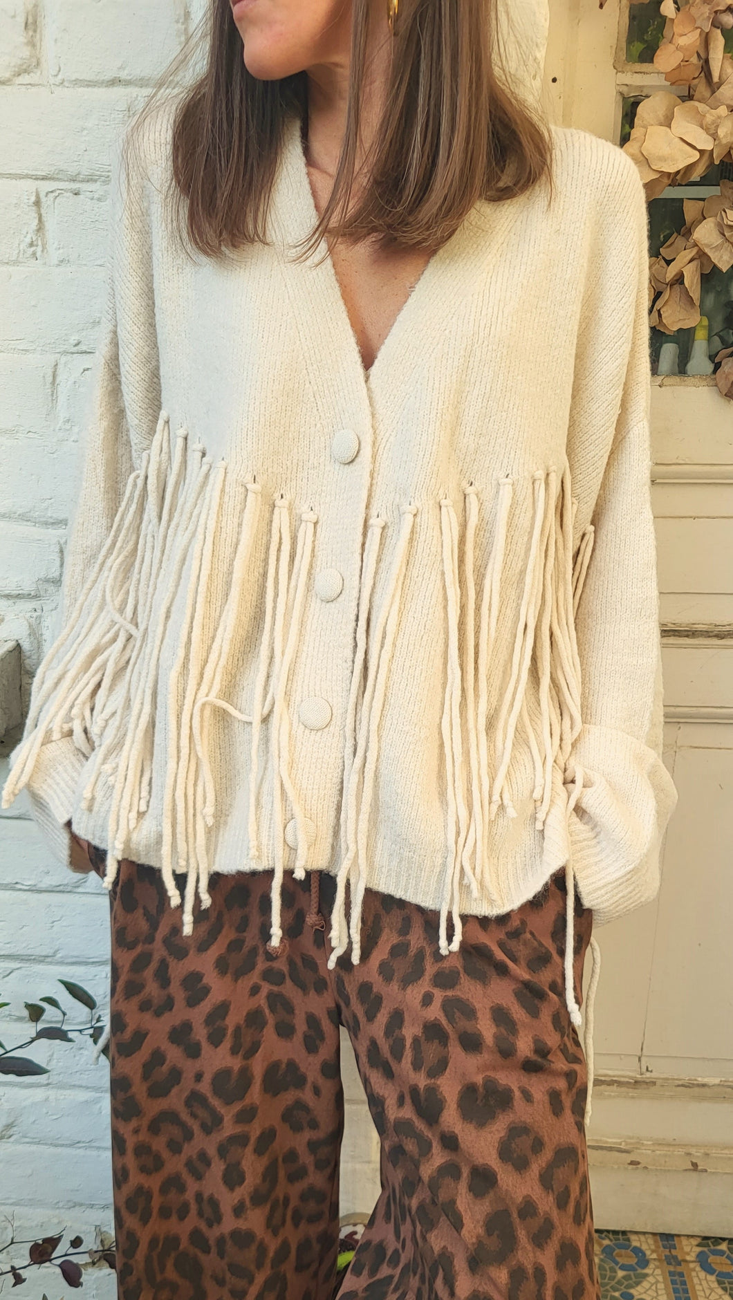 Gilet boutonné frange